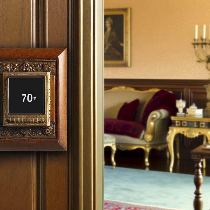 DALL·E 2024-04-26 19.57.47 - A stylish, traditional thermostat that blends seamlessly into a classic home decor with a modern twist.